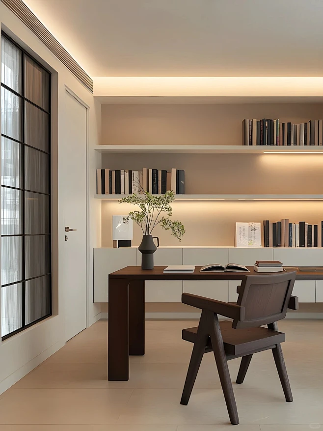 LED Strip Lighting for Bookshelves and Ceiling Coves Warm white LED strip lights illuminating bookshelves and a ceiling cove in a home office